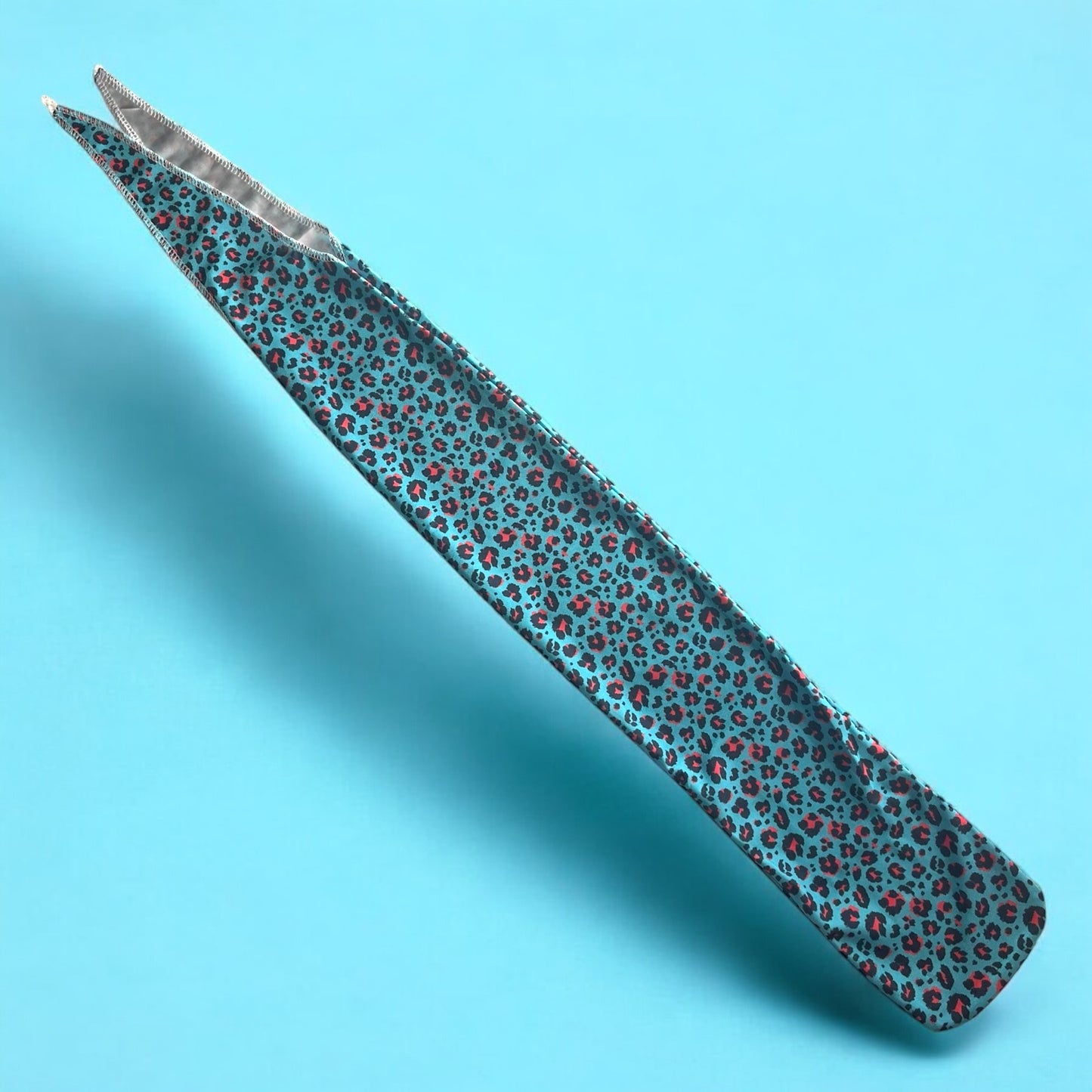 AQUA CHEETAH TAIL BAG